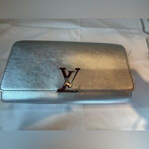 Louis Vuitton Louise Clutch in Metallic Silver Leather